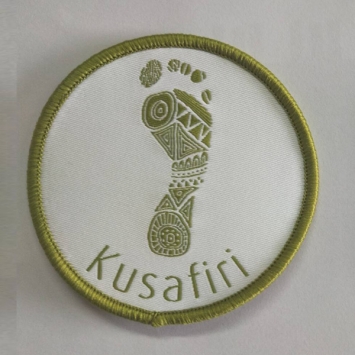 Kusafiri badge