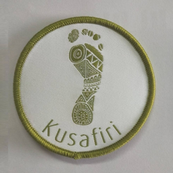 Kusafiri badge